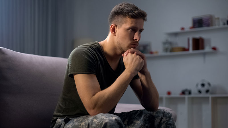 solder sitting on couch