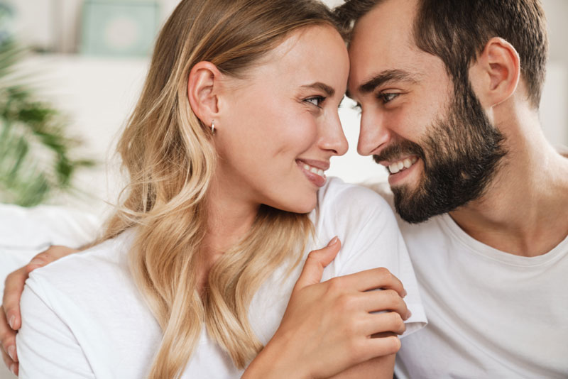 man and woman looking into each others eyes