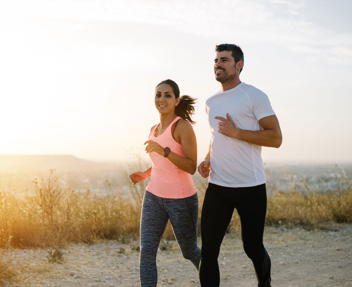 man and woman running